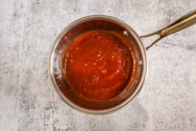 Creamy tomato sauce in a saucepan.