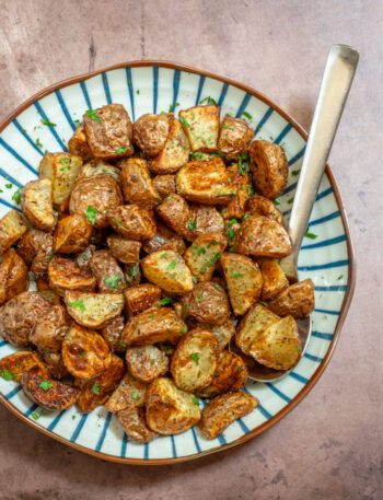 air fryer potatoes in a serving dish