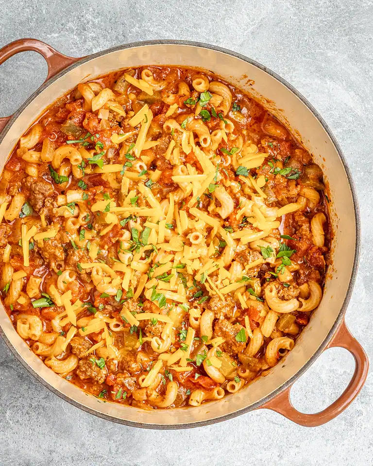 Creamy pasta bake with ground beef and cheese topping.