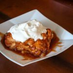 apple dumpling with whipped cream