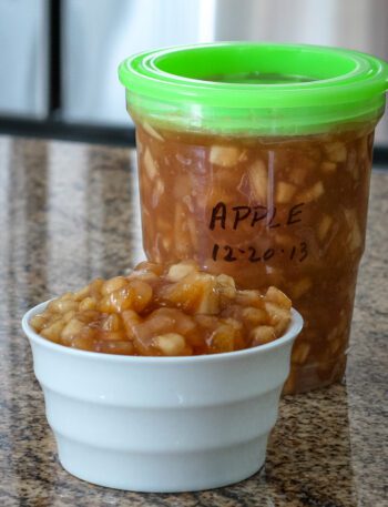 Apple dessert filling in a freezer container.