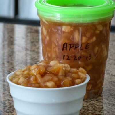 Apple dessert filling in a freezer container.