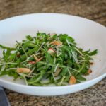 arugula salad with almonds and orange vinaegrette