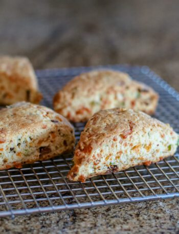 baked bacon and cheddar scones on a cooling rack