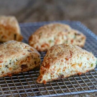 baked bacon and cheddar scones on a cooling rack