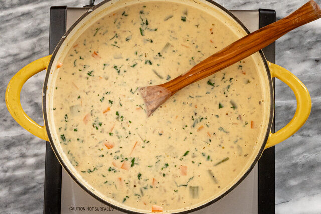 Making cheeseburger soup