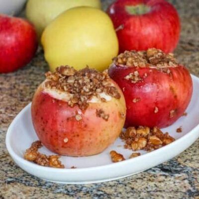 baked apples on a small plate