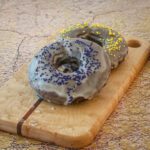 baked glazed chocolate donuts with sprinkles