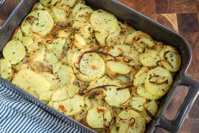 Baked lyonnaise potatoes in the baking dish.