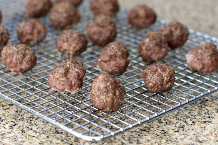baked meatballs on a cooling rack