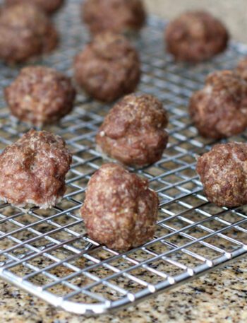 baked meatballs on a cooling rack