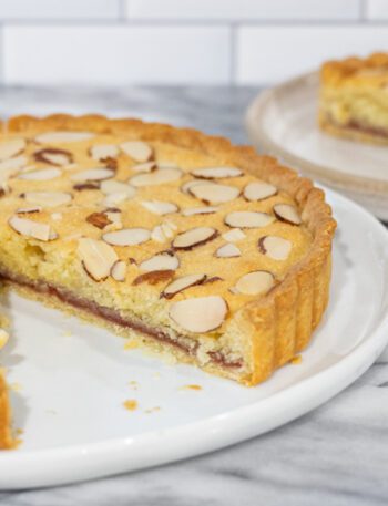 bakewell tart with a slice in the background
