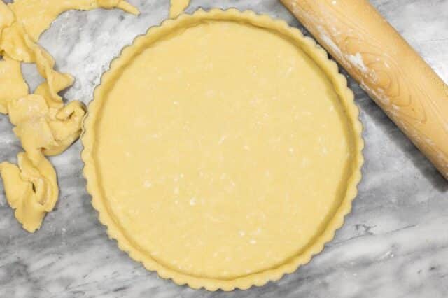 Bakewell tart dough lining the tart pan