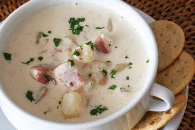 closeup of clam chowder with bacon in a bowl 