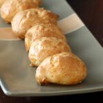 plate of freshly baked gougeres