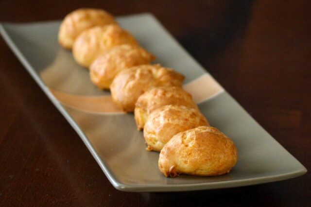 platter with several freshly baked gougères