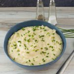 instant pot mashed potatoes in a serving bowl