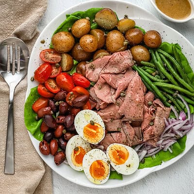 A unique nicoise salad made with roast beef instead of tuna.