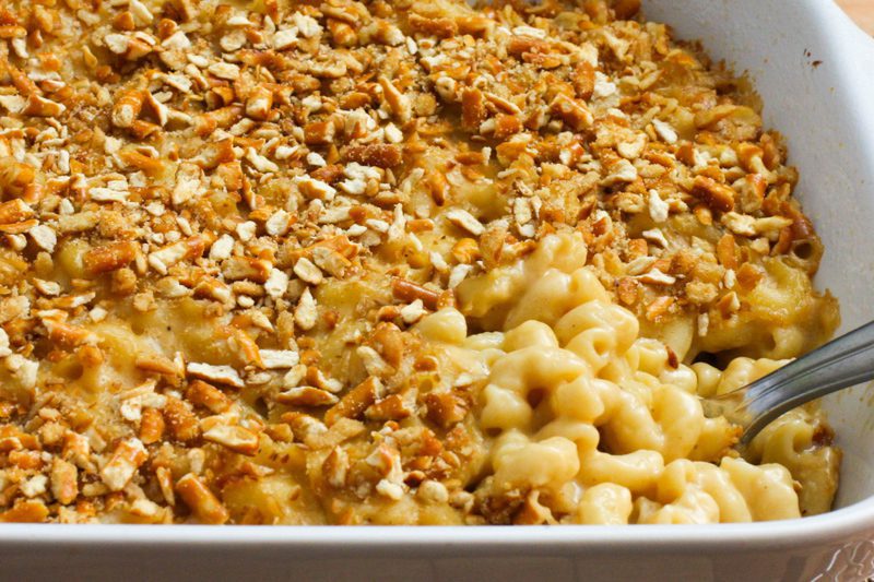 closeup of beer macaroni and cheese with pretzel topping.