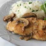 best chicken marsala with mushrooms on a plate with rice