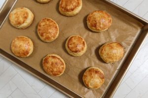 baked biscuits on a baking sheet.