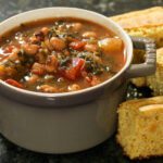 black-eyed pea soup with cornbread on the side