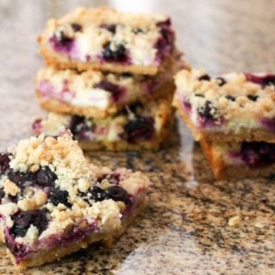 blueberry cheesecake bars stacked