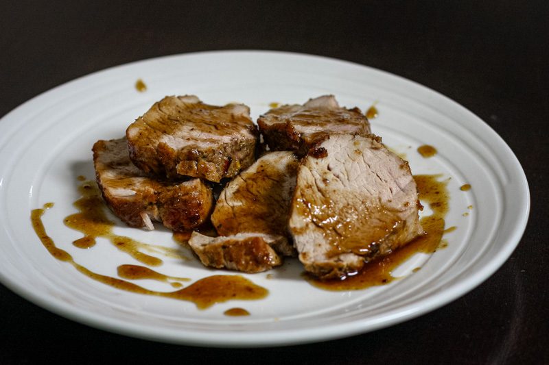 bourbon glazed pork tenderloin on a plate