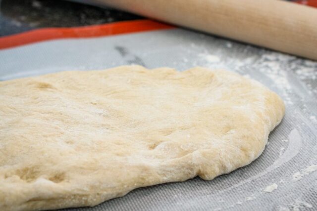 cinnamon roll dough from the bread machine, rolling it out