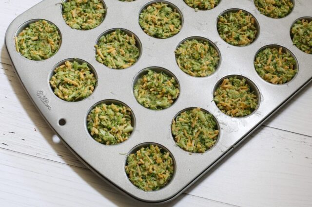 broccoli cheese bites preparation in a mini muffin tin