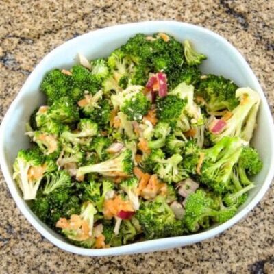 Broccoli salad with miso dressing and sesame seeds.