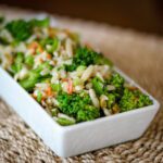 broccoli orzo salad in a serving dish
