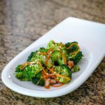 Asian flavored broccoli salad in a small plate