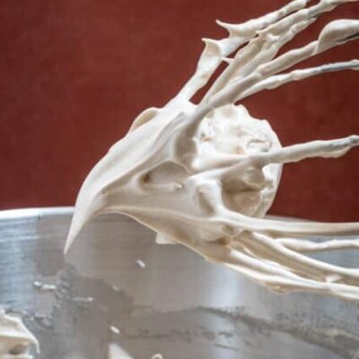fluffy brown sugar meringue on the whisk