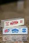 Sticks of butter on the counter.