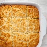 Baked creamy casserole with a golden crust on top.