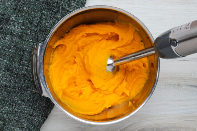 Use a masher or immersion blender to mash the butternut squash.