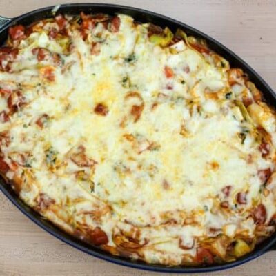 cabbage casserole with sausage in a staub baking dish