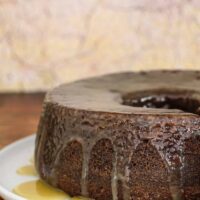 Caramel glaze shown on a fig preserves cake.