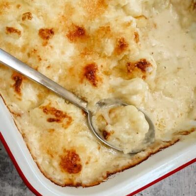 British cauliflower cheese in a baking dish.