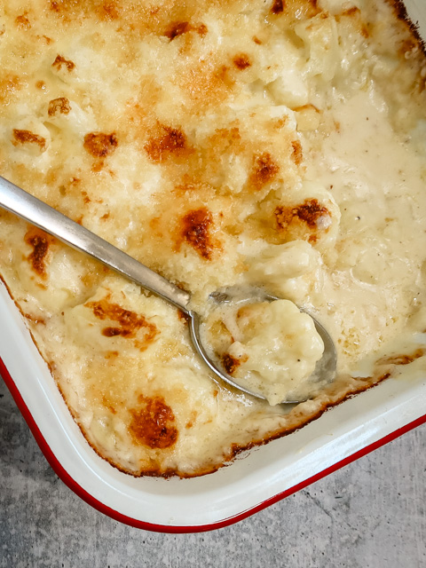 British cauliflower cheese in a baking dish.