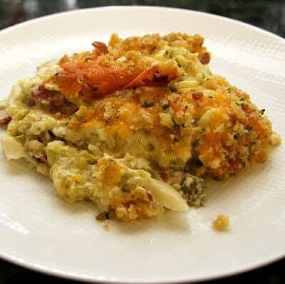 cabbage casserole with bacon and cheddar cheese on a plate