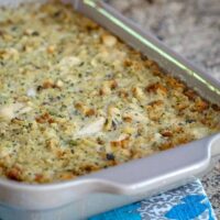 Chicken and dressing casserole in a baking dish, ready to dig in and enjoy.