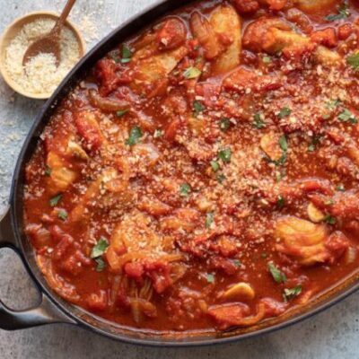 chicken kapama with chicken thighs and tomatoes in ready to serve