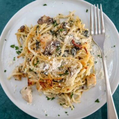 chicken tetrazzini serving on a plate with fork