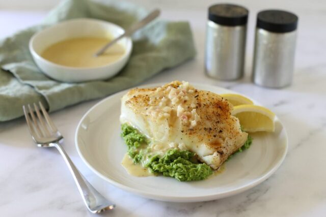 chilean sea bass with beurre blanc lemon sauce and pea puree