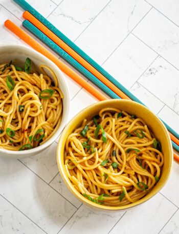 chili garlic noodles in small bowls