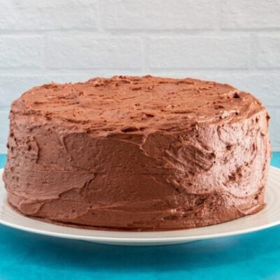 layer cake with chocolate buttercream frosting