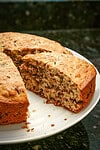 Moist banana bread with mixed nuts and raisins.