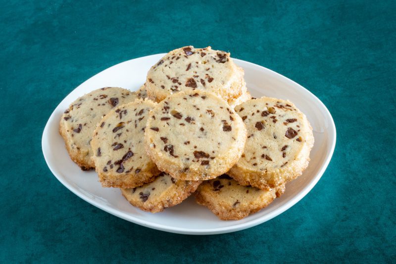 A plate of chocolate chip sablé cookies